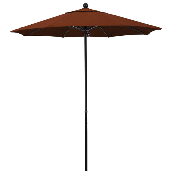 A California Umbrella with a terracotta canopy on a black pole.