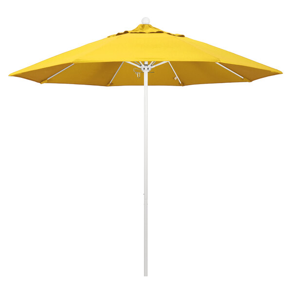 A yellow California Umbrella with a lemon yellow Olefin canopy on a white pole.