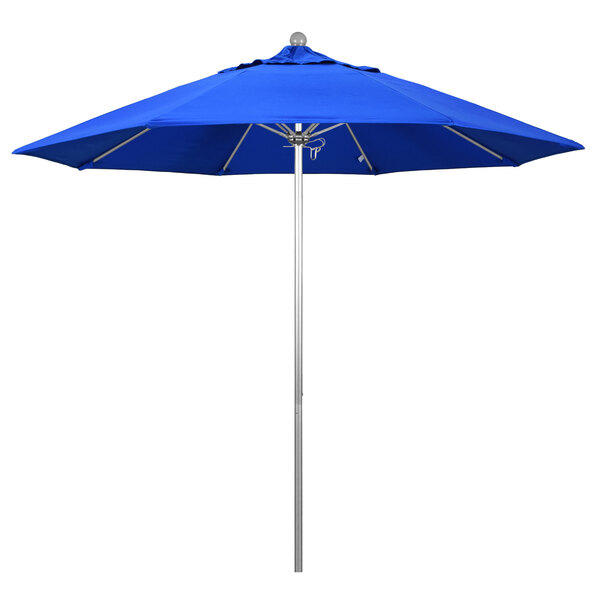A California Umbrella ALTO round umbrella with a Pacific Blue Sunbrella canopy on a silver metal pole.