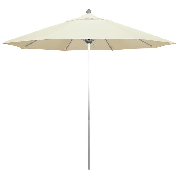 A white California Umbrella on a silver metal pole.
