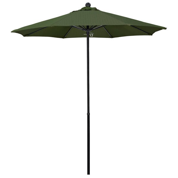 A green California Umbrella on a black pole on a white background.