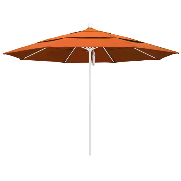 A California Umbrella with Sunbrella Tuscan fabric canopy and a white pole.