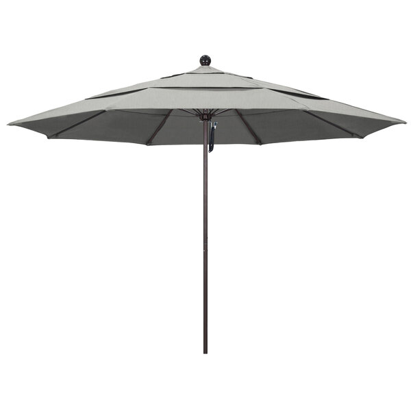 A California Umbrella ALTO round outdoor umbrella with a Sunbrella granite canopy on a bronze pole.