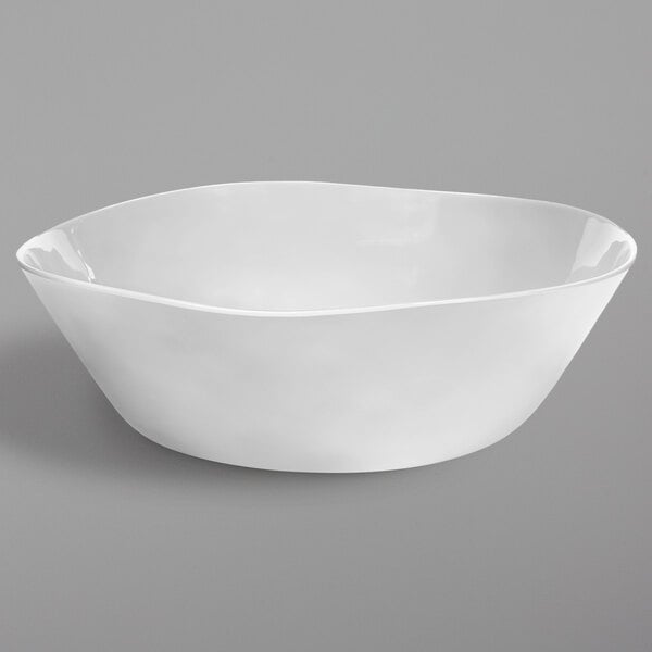 a white bowl on a gray background