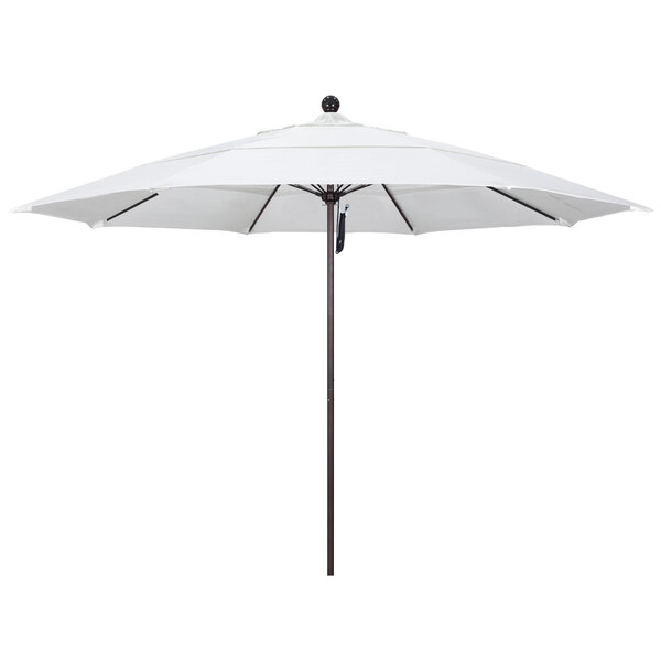 A white California Umbrella with a bronze pole.