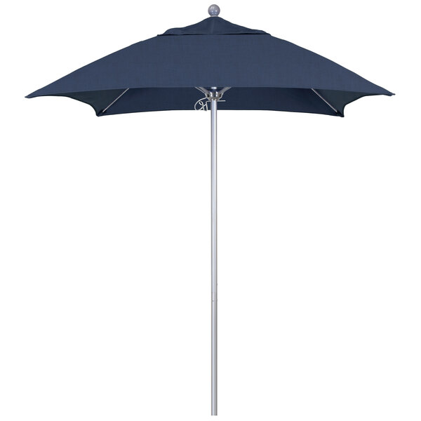 A California Umbrella with a blue Sunbrella canopy on a silver pole.