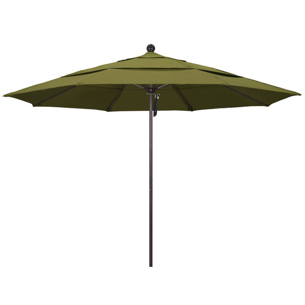 A green California Umbrella on a bronze pole.