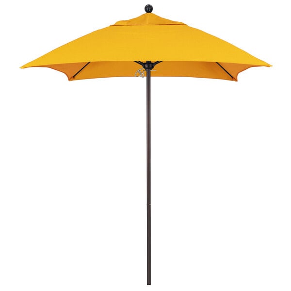 a yellow umbrella on a white background