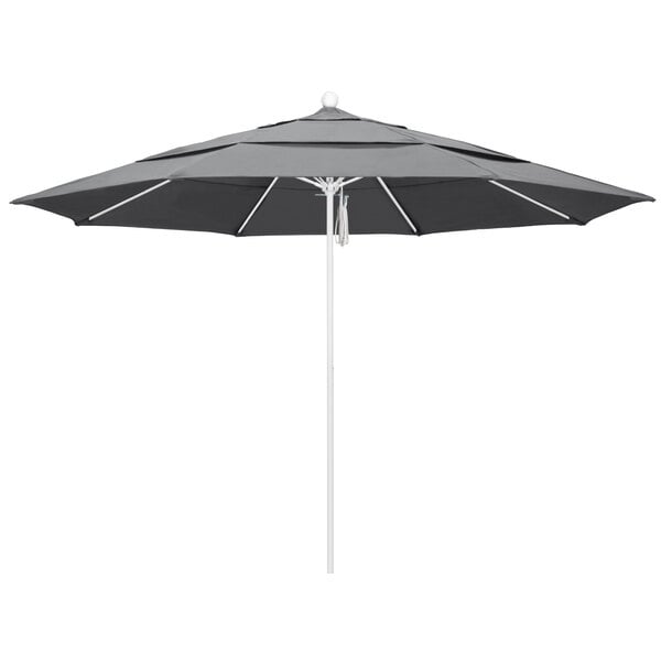 A close-up of a black California Umbrella with a white pole.