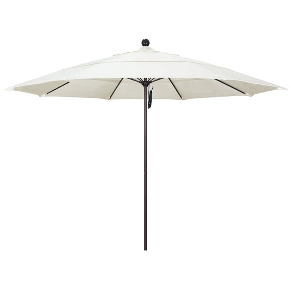 A white California Umbrella with a bronze pole.