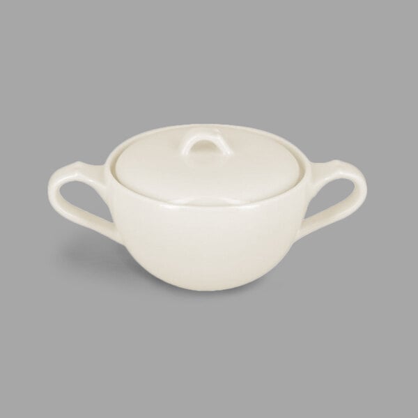 A white porcelain RAK Porcelain Anna sugar bowl with a lid and two handles.