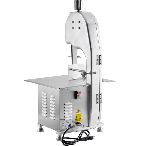 A Backyard Pro countertop vertical band meat saw with a stainless steel finish and a power cord.