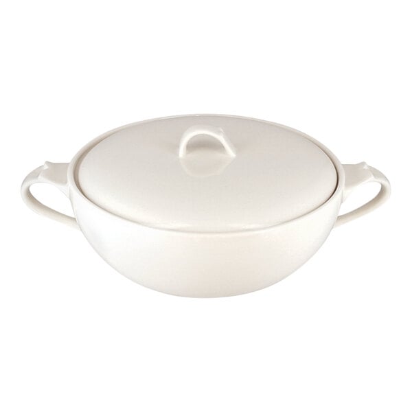 A large ivory porcelain soup tureen with a lid and two handles.