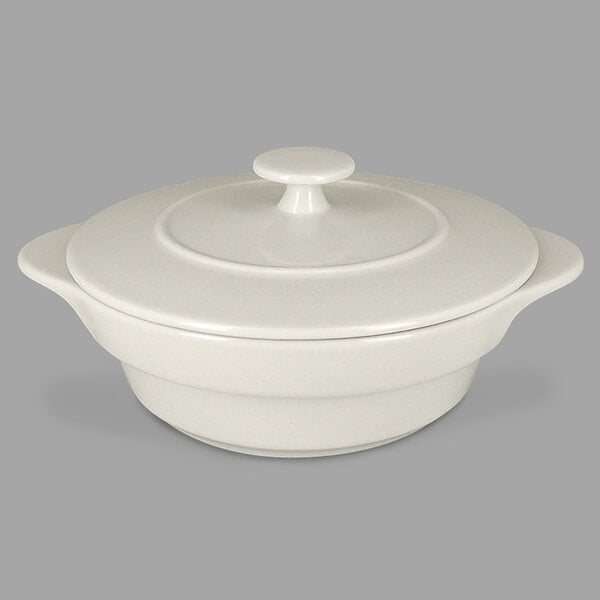 A white round RAK Porcelain cocotte with a lid.