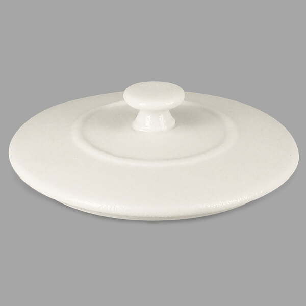 A RAK Porcelain Chef's Fusion white porcelain lid with a round handle.