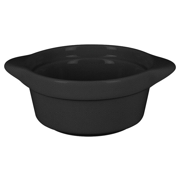 A black RAK Porcelain mini cocotte with a handle.