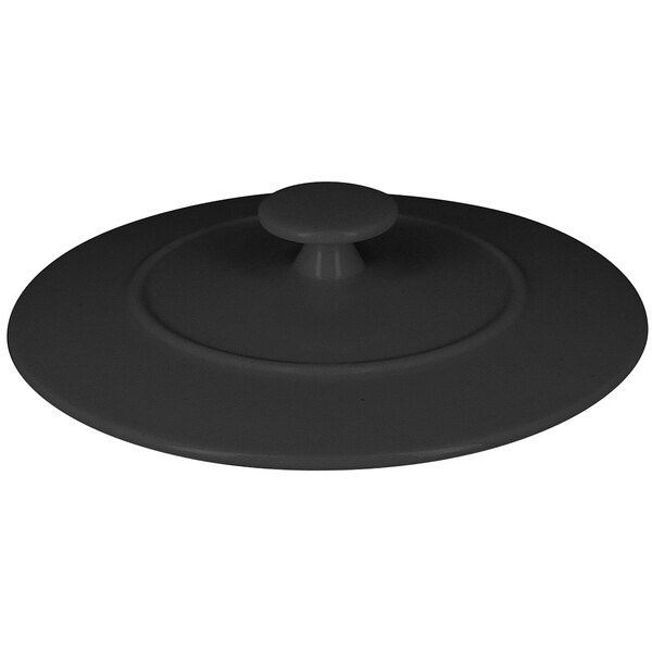 A black lid with a round handle.