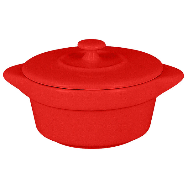 a red bowl with a lid