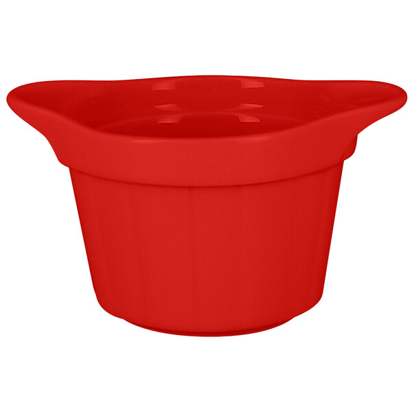 A RAK Porcelain Ember Red ramekin with grooves on a white background.