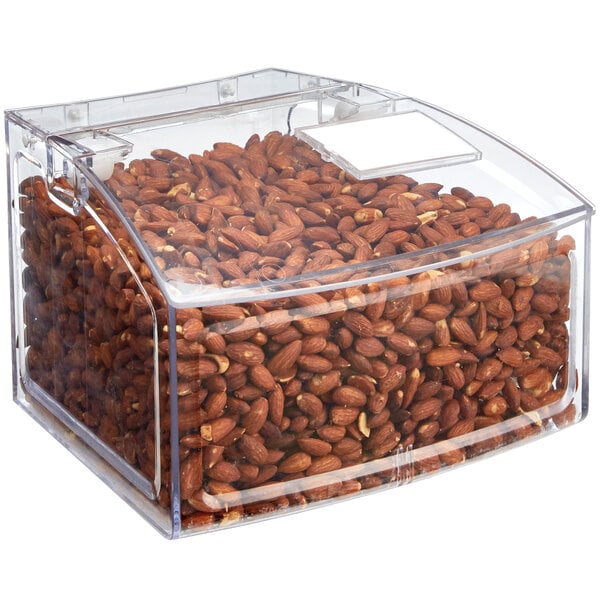 a clear container with nuts in it