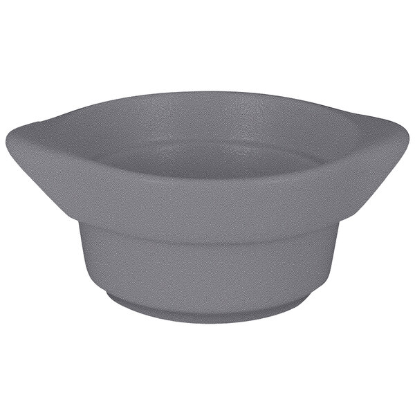 A stone gray RAK Porcelain round cocotte with a handle.