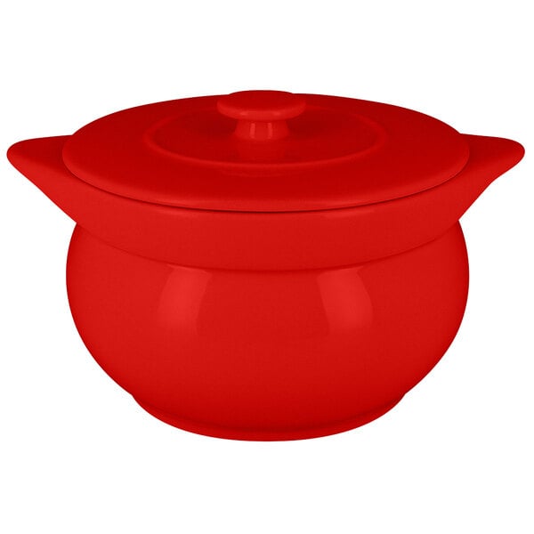 A red pot with a lid.