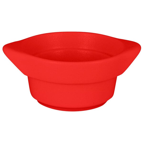 a red bowl with a white background