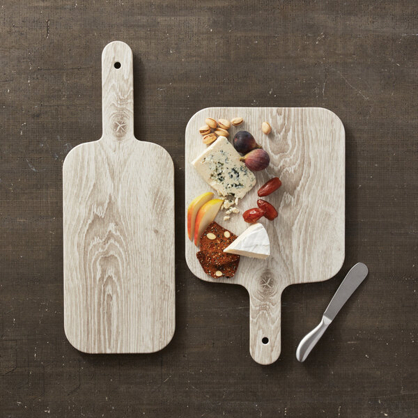 An American Metalcraft faux whitewash wood melamine rectangular serving peel with cheese and fruits on it.
