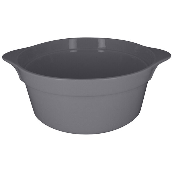 A stone gray RAK Porcelain round cocotte with handles and a lid.