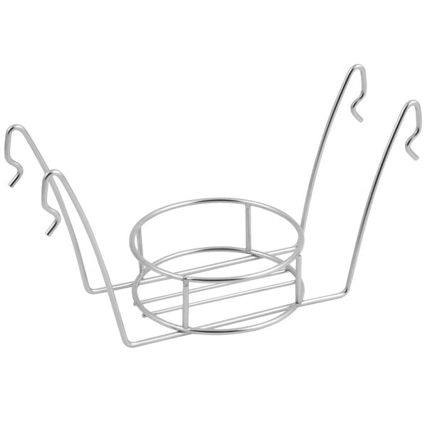 A stainless steel metal rack with four hooks.