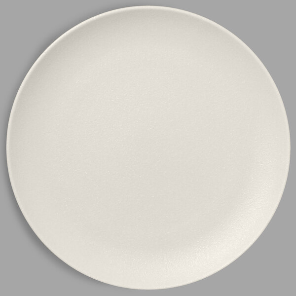 A RAK Porcelain white flat coupe plate on a white surface.