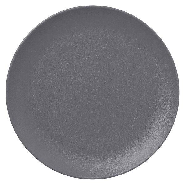 A close-up of a RAK Porcelain stone gray flat coupe plate.