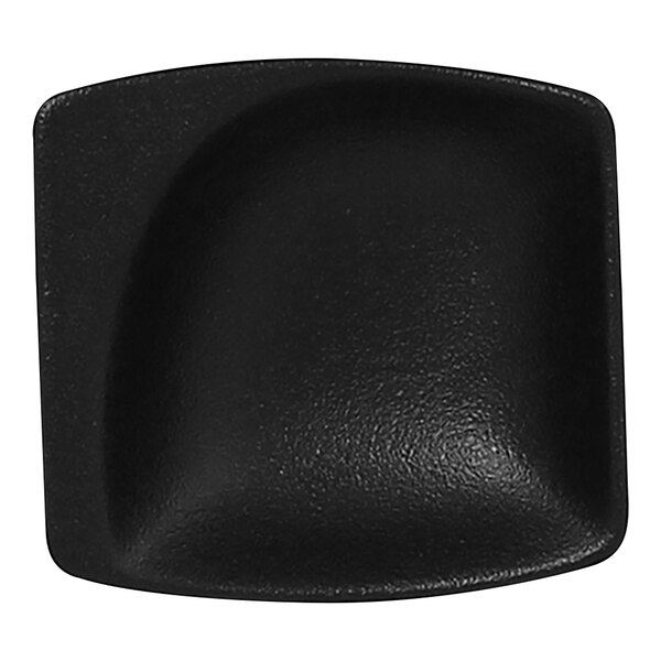 A black porcelain mini square dish with a rounded edge.