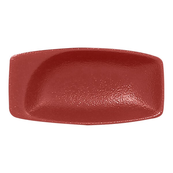 A red rectangular porcelain dish with a white background.