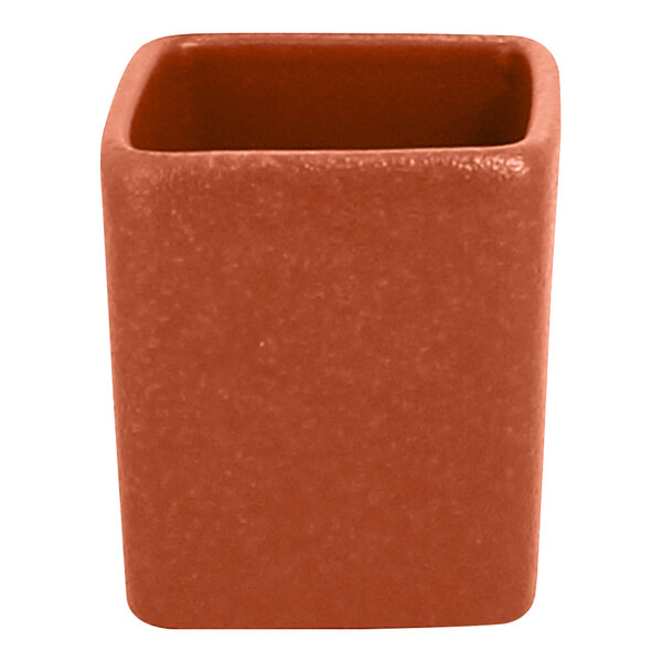 A red rectangular RAK Porcelain ramekin with a lid.