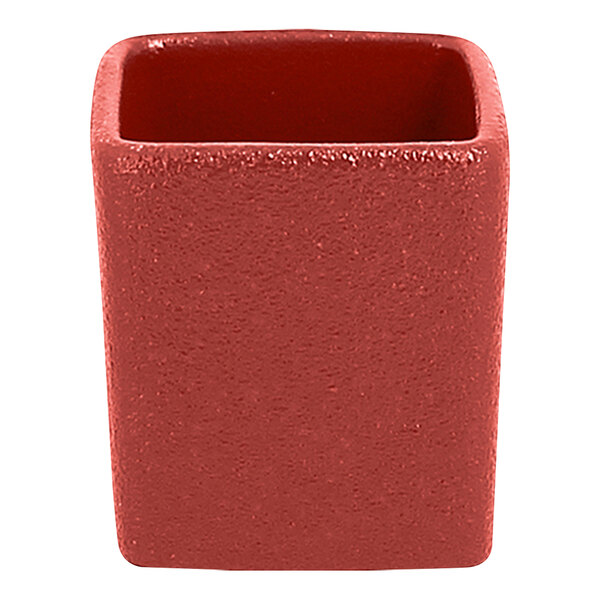 A stackable red RAK Porcelain ramekin with a square top.