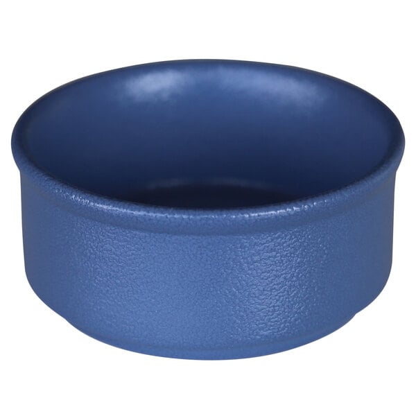 A blue RAK Porcelain ramekin with a white background.