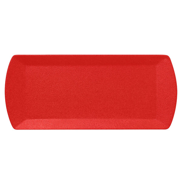 A red rectangular RAK Porcelain sandwich tray with a curved edge.