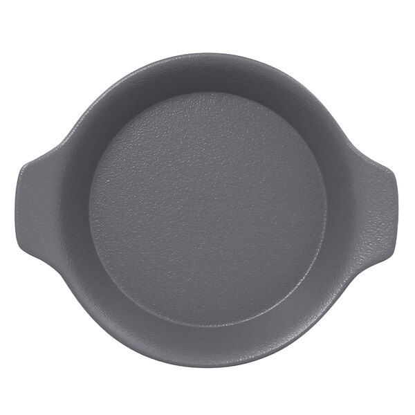 A close-up of a stone gray RAK Porcelain dish with handles.