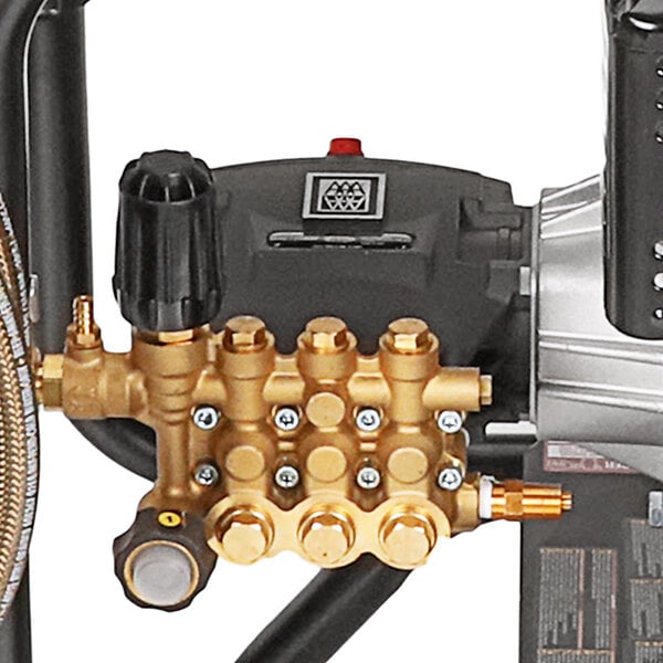 A close-up of a gold and black Simpson Powershot pressure washer with a Honda engine.