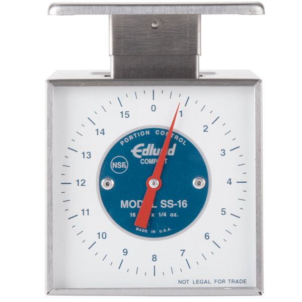 An Edlund stainless steel scale with a blue dial.
