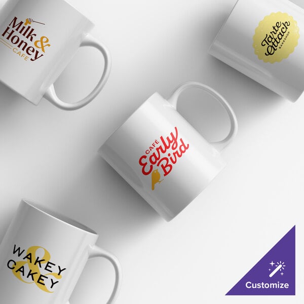A set of four customizable white stoneware mugs with different printed café logos.