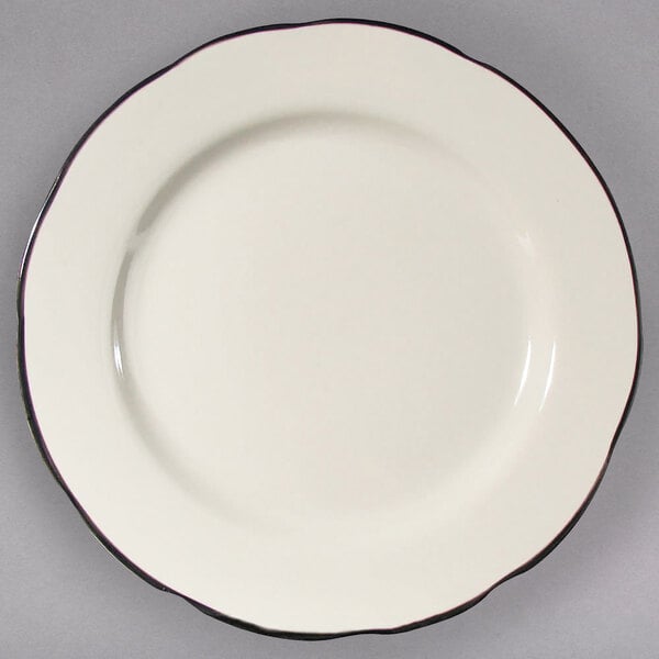 a white plate with black rim