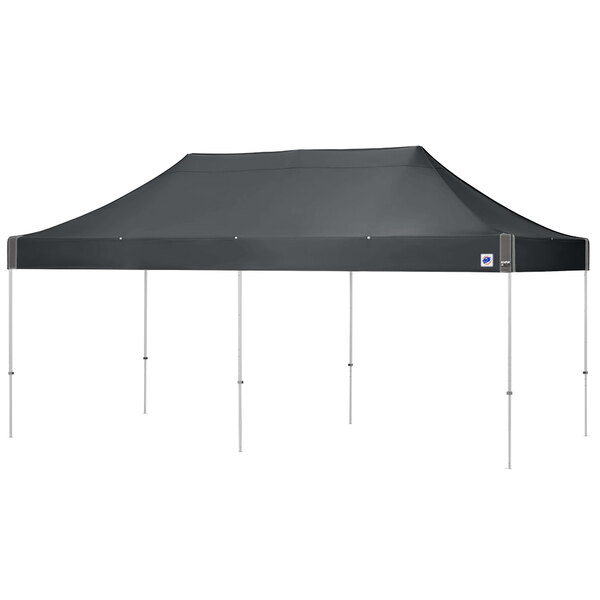 a black tent with poles