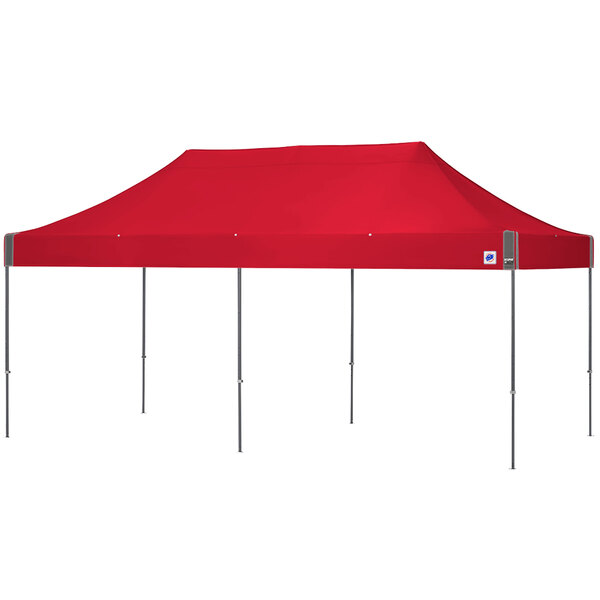An E-Z Up Eclipse canopy with a steel gray frame and punch top over a rectangular area.
