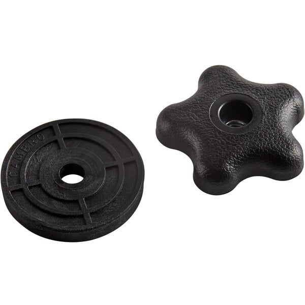 A black plastic round knob with a star-shaped hole in the middle.