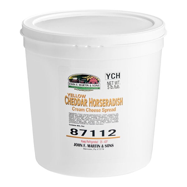 A white container of Cheddar Horseradish Cream Cheese Spread with a lid.