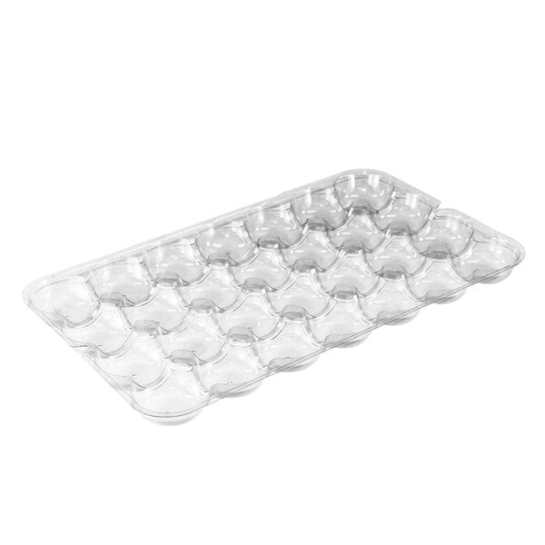 A clear plastic tray with 28 sections and holes in it.