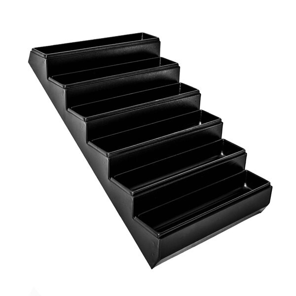 A black plastic staircase with removable pans.