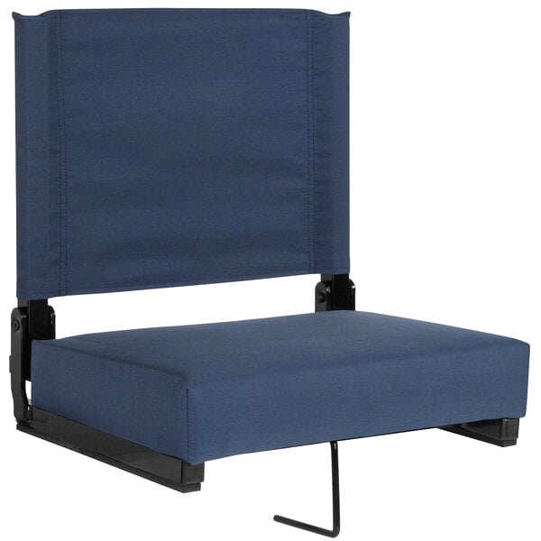 A navy blue cushioned seat for bleachers with a black frame.